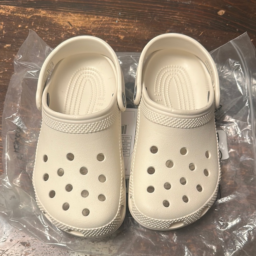 CROCS Cream Sandals with Ventilation and Rotating Heel Strap